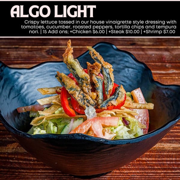 Algo Light salad with crispy lettuce, tomatoes, cucumber, roasted peppers, tortilla chips, and tempura nori.