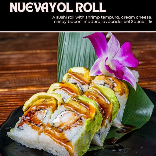 Nuevayol Roll sushi with shrimp tempura, avocado, and eel sauce, garnished with an orchid.
